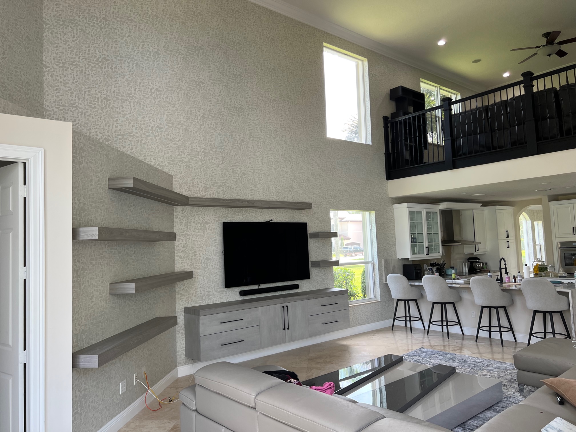 Professional luxury wallpaper installation in Miami Brickell tower with Downtown skyline views